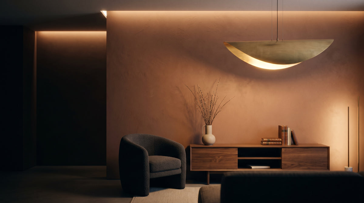 Modern living room glowing with warm Solsence pendant and wall lighting at dusk