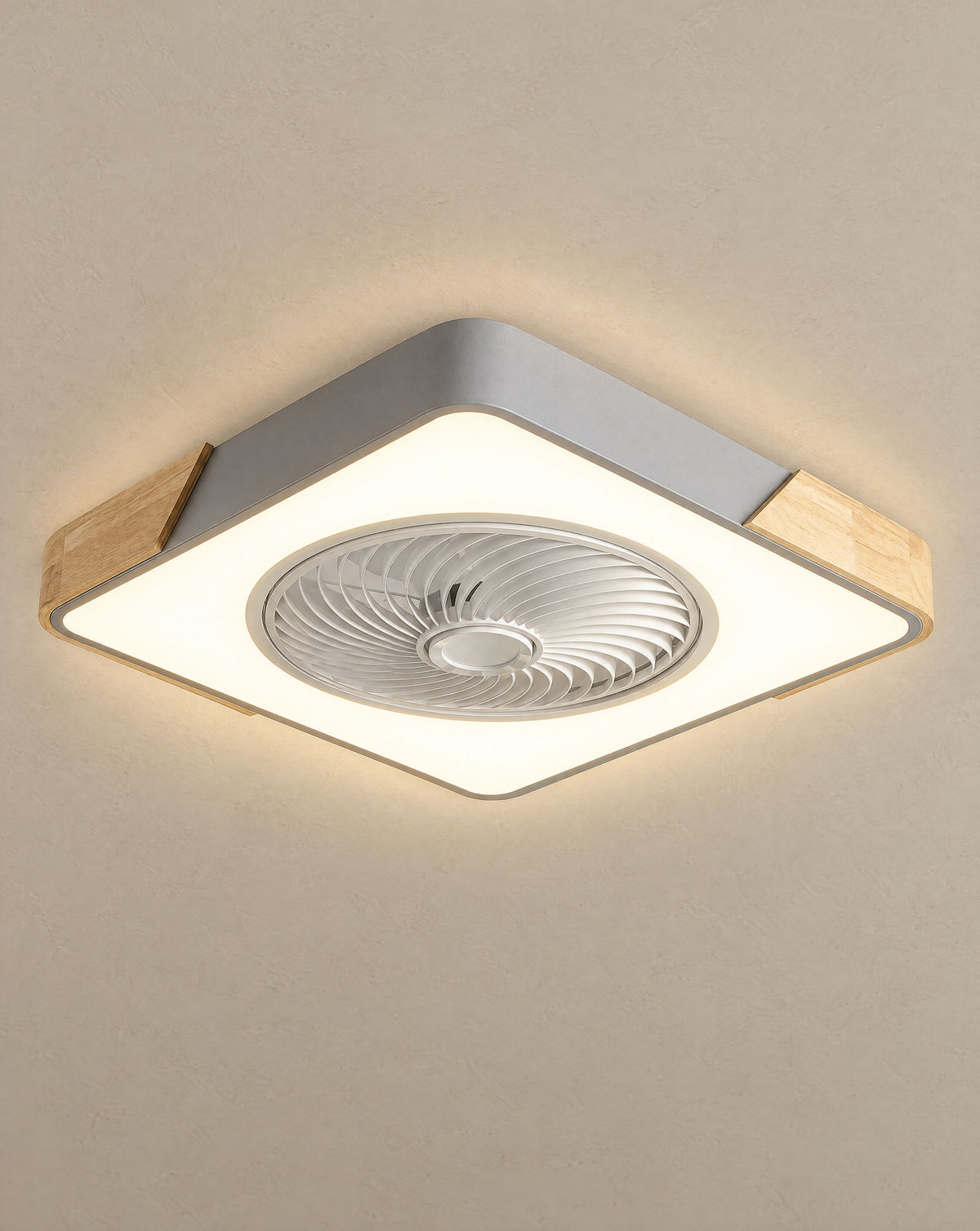 Solsence Aeris gray square bladeless ceiling fan with light lit with warm 3000K glow against a greige backdrop