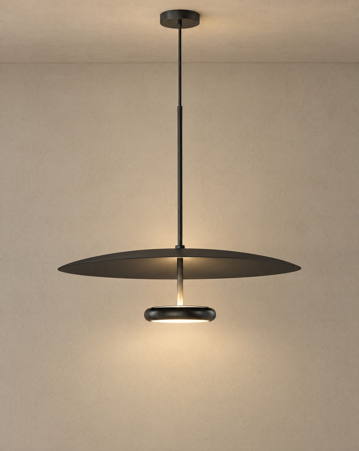 Solsence Walden mid-century pendant light - Black lit with warm 3000K glow on a greige wall