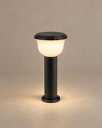 Solsence Calyx hardwired path light lit with warm 3000K glow against a greige backdrop