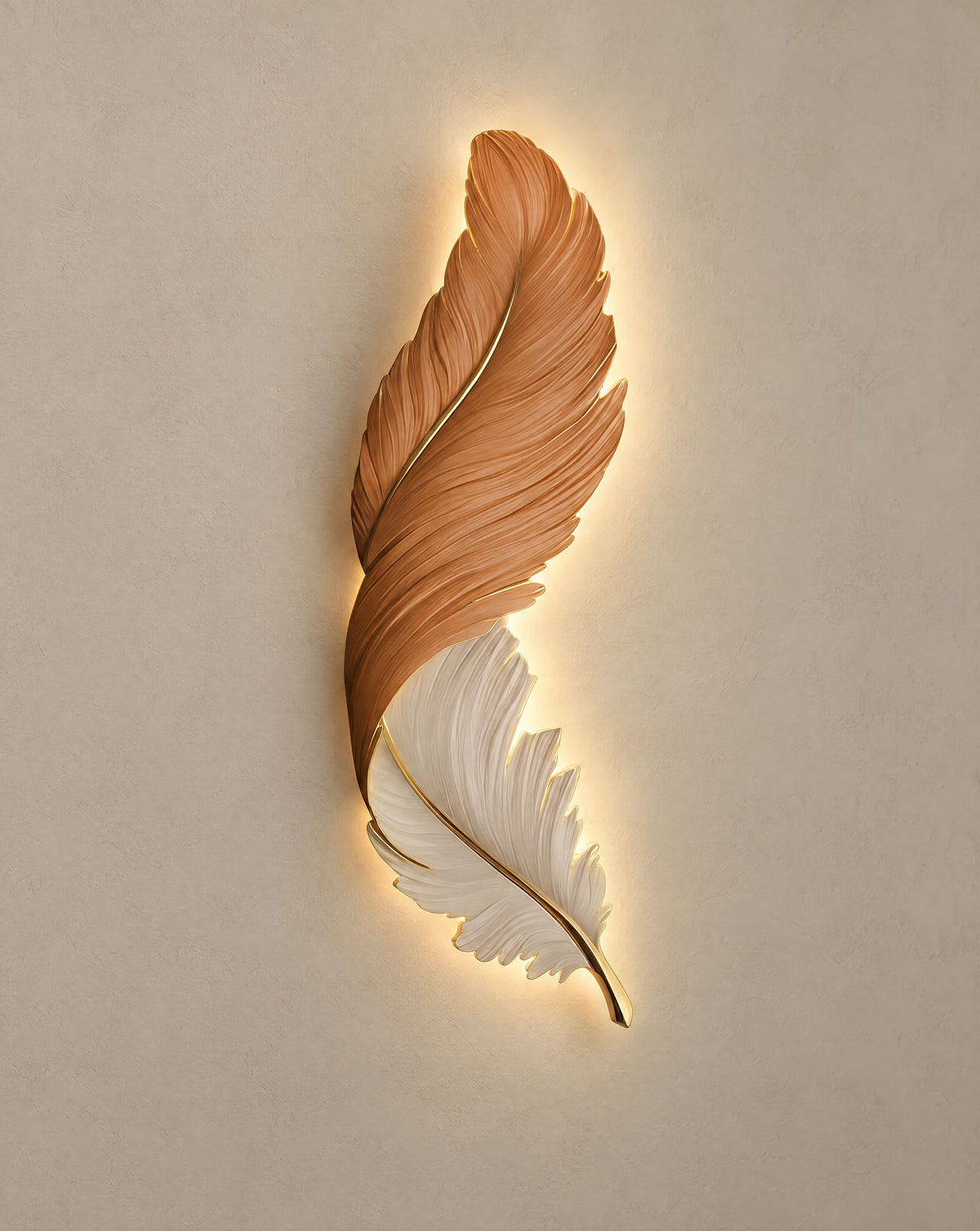 Solsence Aviary Orange feather LED wall lamp lit with warm 3000K glow on a greige wall