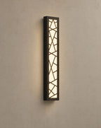 SCI Lighting Meridian linear outdoor wall light lit with warm 3000K glow on a greige wall