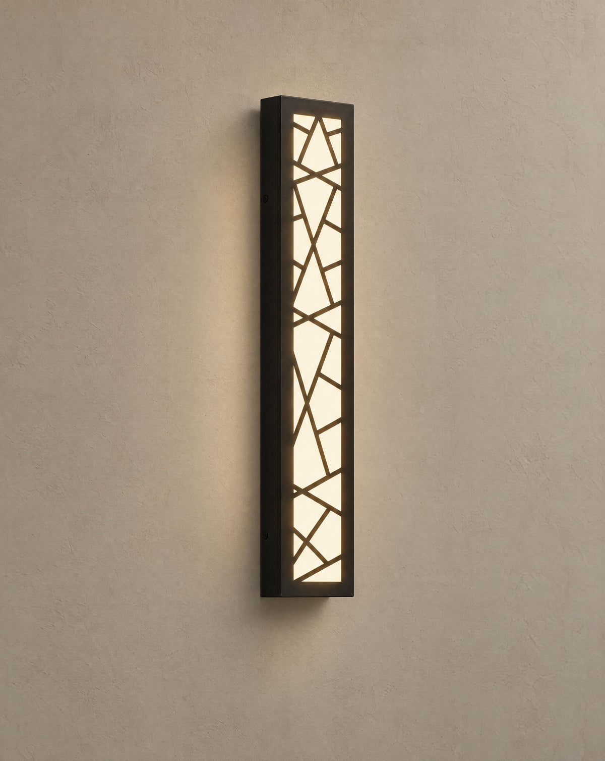 Solsence Meridian linear outdoor wall light lit with warm 3000K glow on a greige wall
