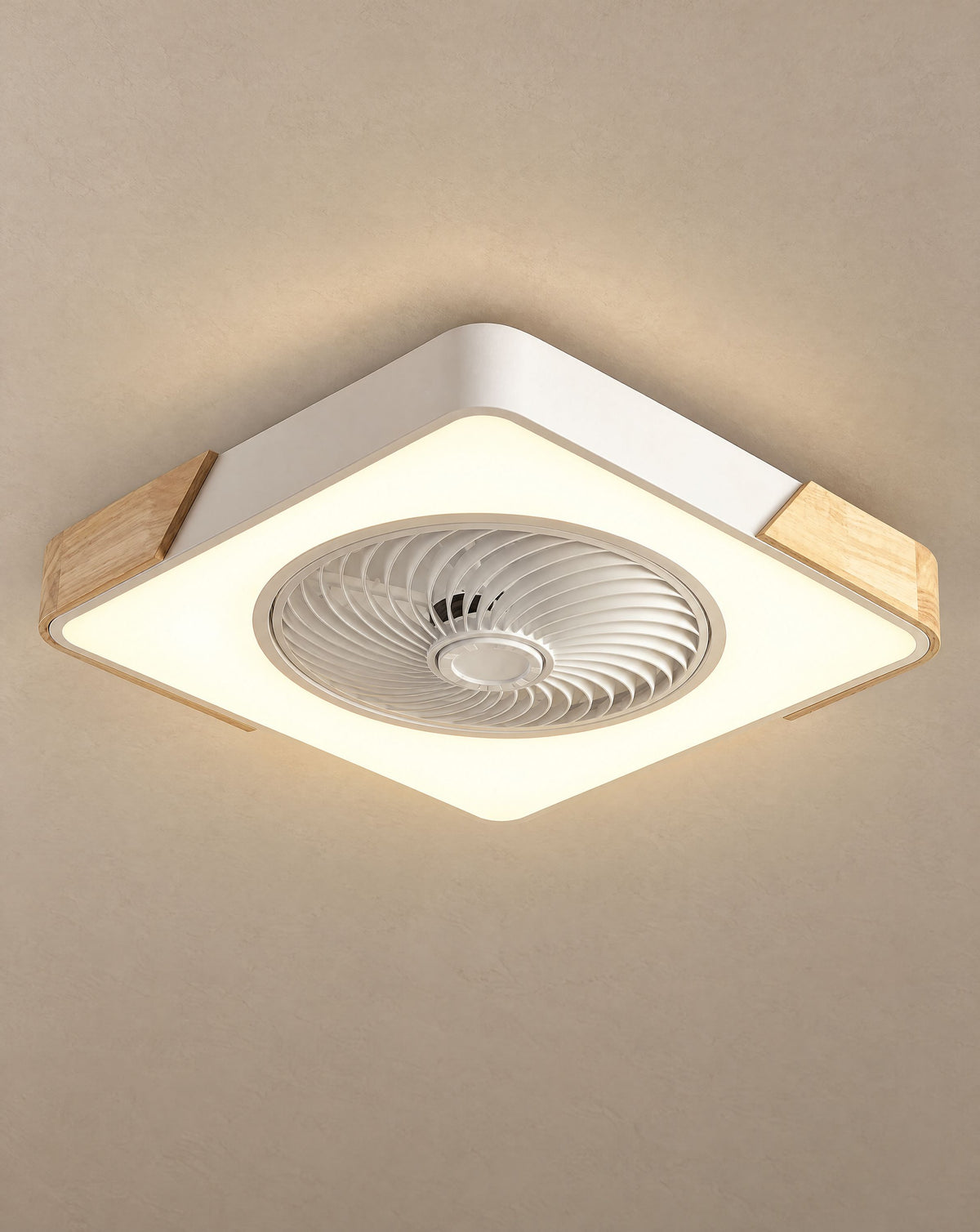 Solsence Aeris white square bladeless ceiling fan with light lit with warm 3000K glow against a greige backdrop