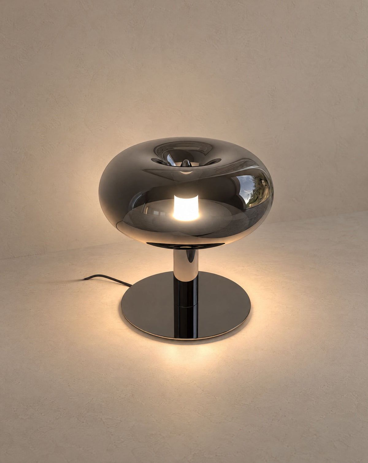 Solsence Fungo mushroom table lamp - Black Chrome lit with warm 3000K glow on a greige wall