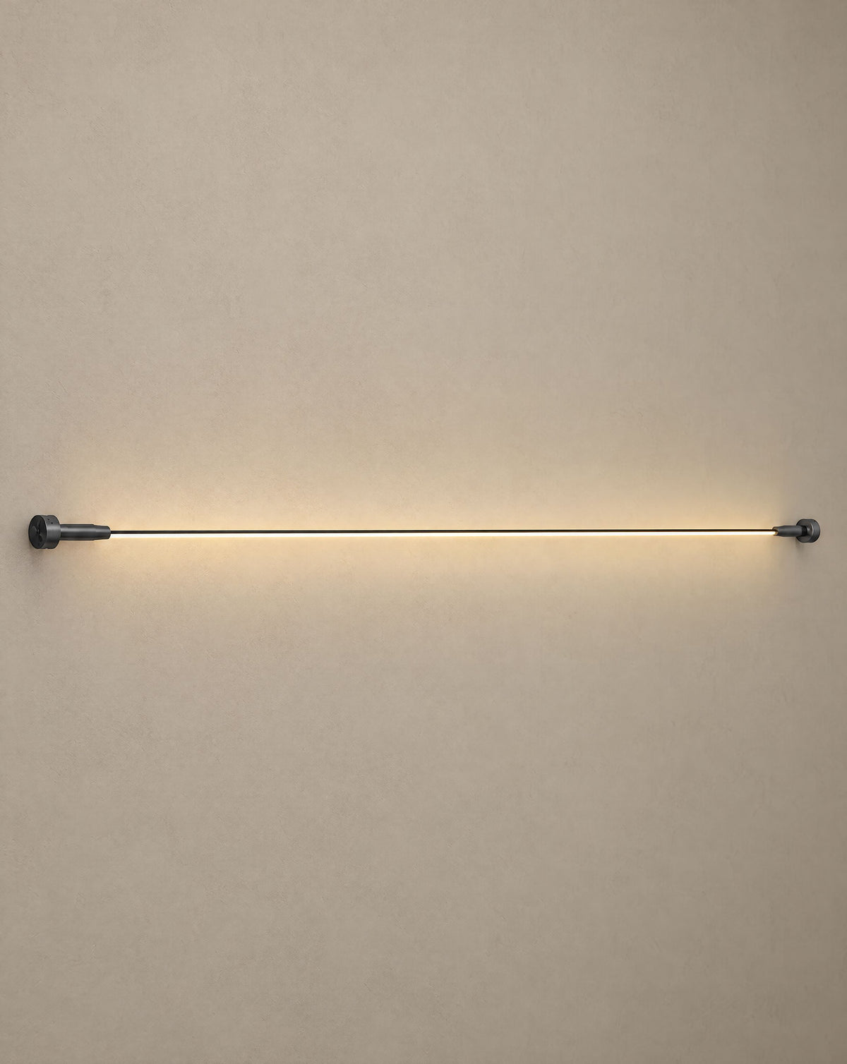 Solsence Strand black linear LED strip light lit with warm 3000K glow against a greige backdrop
